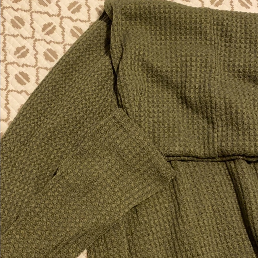 Green turtle neck shirt